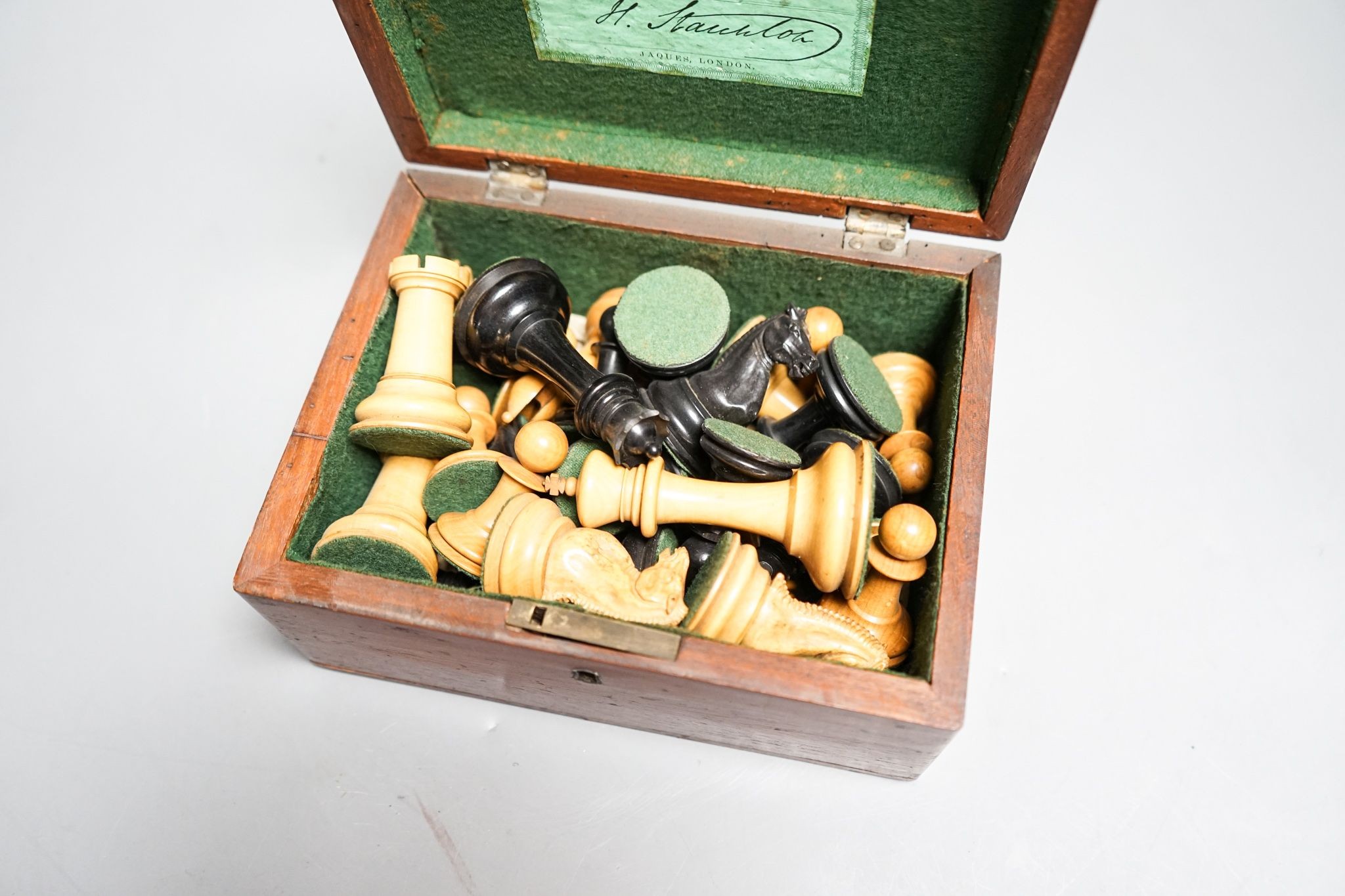 A boxed Jaques Staunton boxwood and ebony chess set, White king stamped Jaques London, 8.5cm high